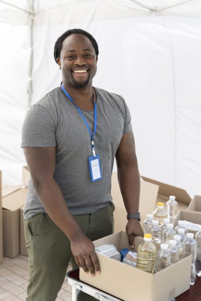 man-preparing-foodbank-poor-people man-preparing-foodbank-poor-people